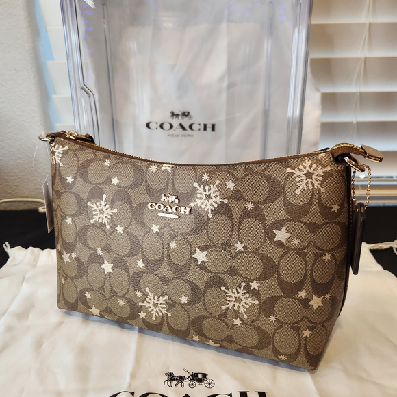 Coach Handbags - Coach Brown Snowflake Clutch